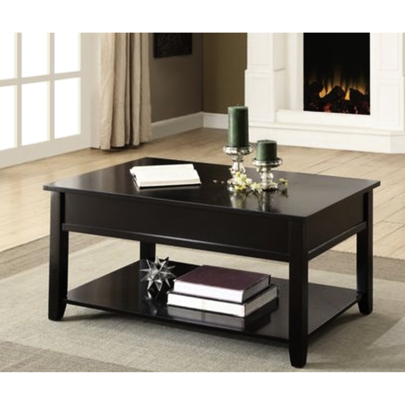 Table basse à plateau relevable en noir avec forme rectangulaire et compartiments de rangement dissimulés