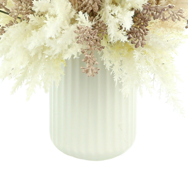 Pampas And Eucalyptus Arranged In A Ceramic Vase
