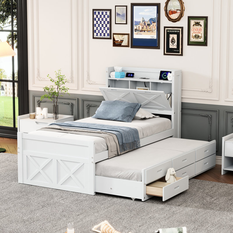 Lit simple en bois avec tête de lit, prises de courant et lit gigogne double extensible avec trois tiroirs pour plus d'espace