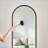 Arched Full Length Mirror with Storage Shelves and Rolling Wheels