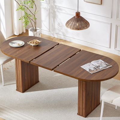 63"–79" Extendable Oval Dining Table with Fluted Base