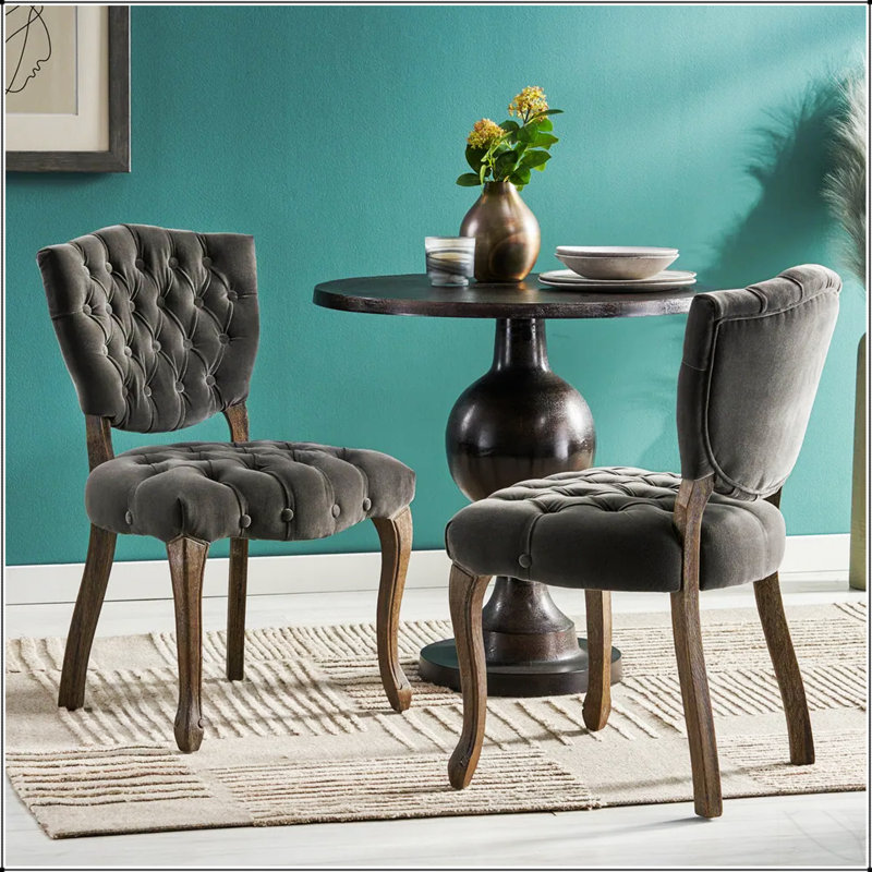 Ensemble de chaises de salle à manger luxueuses capitonnées pour des intérieurs élégants, améliorant le confort et la grâce