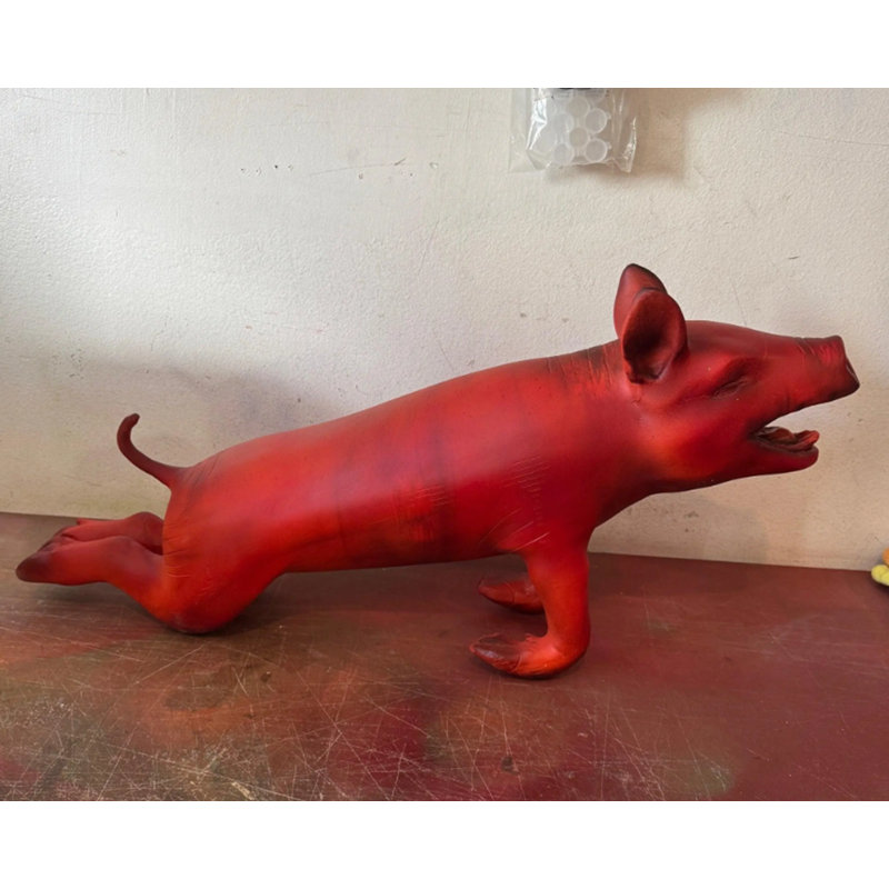 Statue de cochon rôti