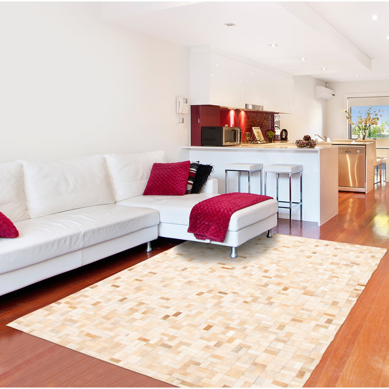 Tapis ivoire en peau de vache Heggi