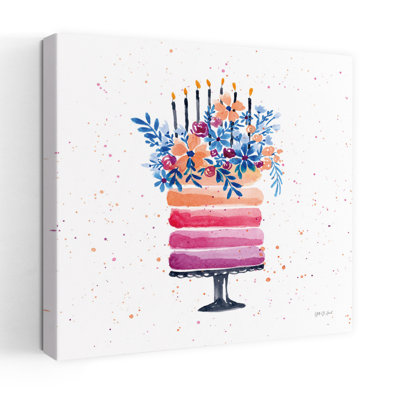 Art floral contemporain avec bougie colorée et bougies