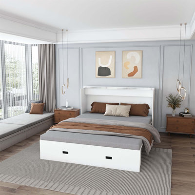 Lit escamotable de 57 pouces avec rangement, station de charge, panneaux pliables et roues pivotantes, idéal pour les chambres d'amis et les petits espaces