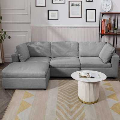 Canapé modulaire en L beige avec ressorts ensachés et mousse haute densité