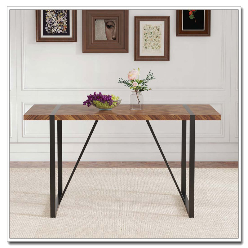 Table de salle à manger rectangulaire avec un dessus spécialement texturé et des pieds en métal noir