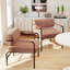 Chaise d'appoint rembourrée en velours avec dossier cylindrique et accoudoirs en métal
