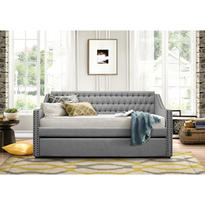 Lit simple avec lit gigogne escamotable gris, capitonné, capitonné, lit de jour recouvert de tissu, bouton, meubles