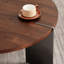 Table basse ronde brune foncée avec plateau en noyer et structure en bois avec pieds en bois noir patiné pour les familles modernes
