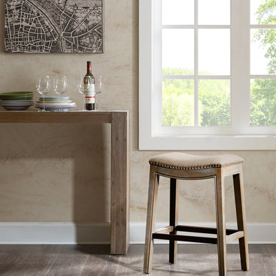Sophisticated Saddle Counter Stool With Foam Inner And Copper Trimming Feature Captivating High Density Lining