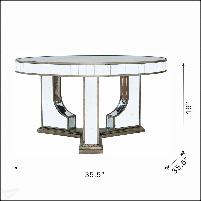 Table basse ronde de 35,5 x 35,5 x 19 pouces avec un élégant motif floral et une finition argentée en miroir, parfaite pour un décor moderne et classique.