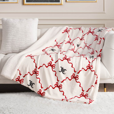 Juicy Couture Plush Reversible Sherpa Throw Blankets