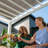 Backyard Discovery Windham 14' x 10' Modern Galvanized Steel Outdoor Patio Pergola Kit with Shade Sail Canopy and PowerPort-90611172