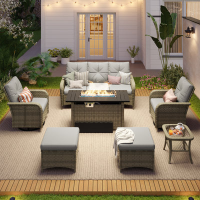 Ensemble de patio extérieur en osier 7 pièces avec table foyer de 44 po et chaises pivotantes
