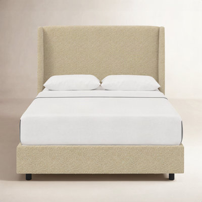 Tilly Upholstered Wingback Bed