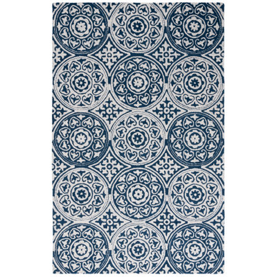 Norissa Hand Tufted Wool/Cotton Geometric Rug in Ivory/Blue
