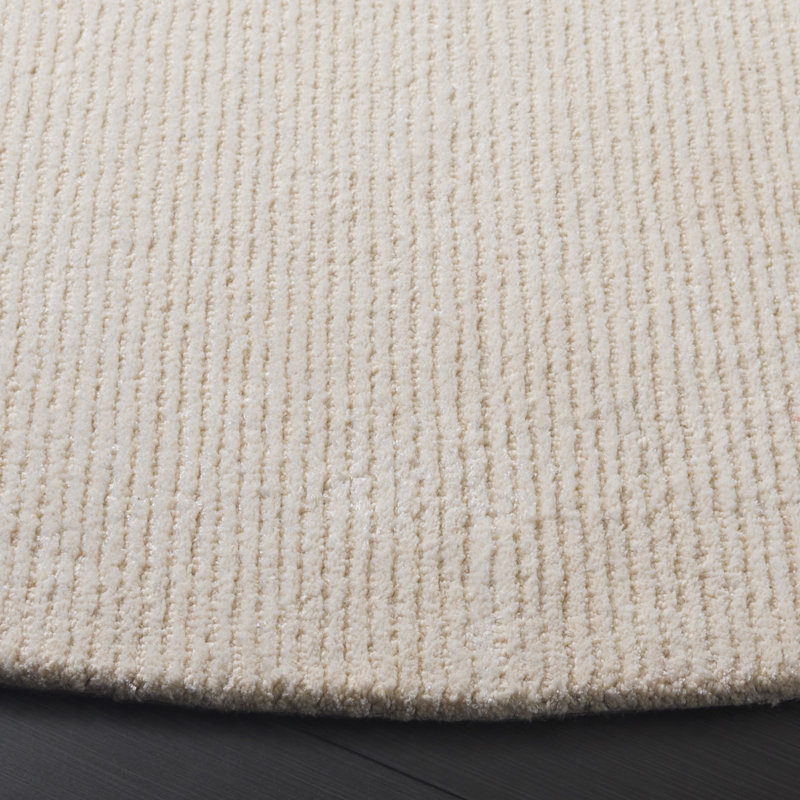 Tapis ivoire en laine, viscose et coton touffeté à la main Maynie, Rond 6 pi