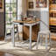 Ensemble de table de bar 3 pièces avec 2 tabourets rembourrés, table basse de bar avec rangement pour bouteilles de vin, tiroir et prise électrique-1000614381