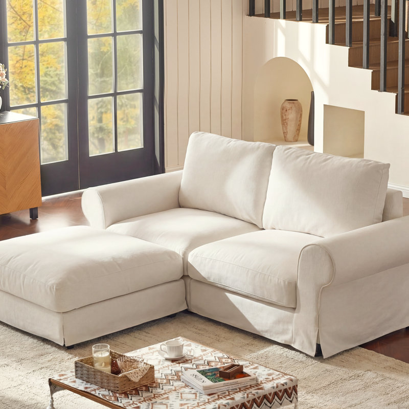 Canapé deux places rembourré avec pouf, accoudoirs arrondis et base à jupe, blanc, Blanc