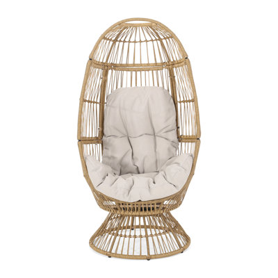 Fauteuil d'extérieur avec coussin brun. Forme de panier confortable. Durable. Rembourrage d'eau. L 27,52 po x l 30,51 po x H 56,95 po. Détails faits à la main. Coussin pivotant brun requis pour l'assemblage.