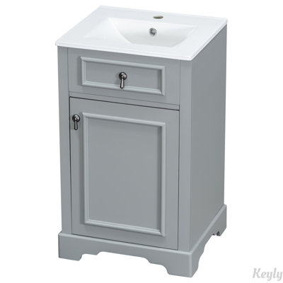 Meuble-lavabo de 20 pouces avec lavabo en céramique, porte à fermeture douce, tablette réglable et support de rangement fixé à la porte