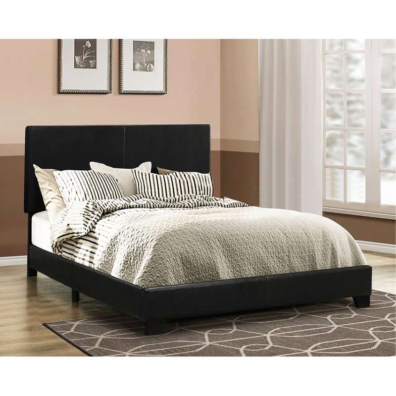 Structure de lit moderne en similicuir noir avec un profil complet épuré et élégant pour un espace de chambre à coucher élégant et relaxant