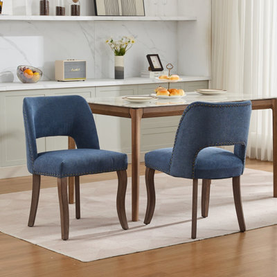 2 chaises de salle à manger bleues avec tissu respirant, ressorts en S et rembourrage en mousse, pieds élégants en bois courbé pour les espaces