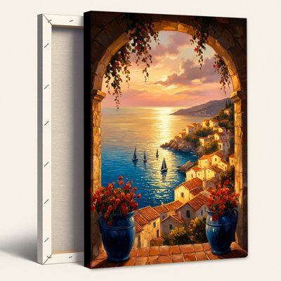 Vue d'un village côtier à travers une arche de pierre avec une fleur bleue - Tableau sur toile