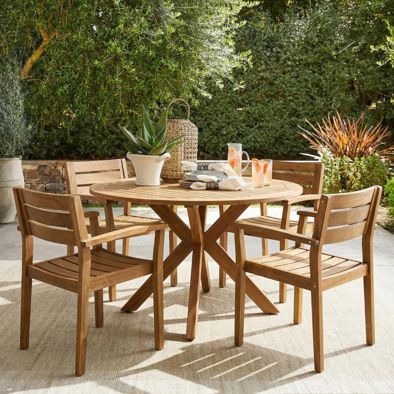 Renaud 4 - Person Wood Patio Dining Set with Round Table