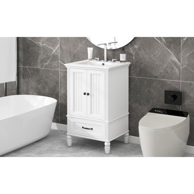 Meuble-lavabo de 20 po avec lavabo central, armoire à deux portes, tiroir, bouchon magnétique, pieds réglables, charnières en acier inoxydable de conception moderne, blanc peint