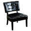 Fauteuil surdimensionné en similicuir noir avec capitonnage luxueux