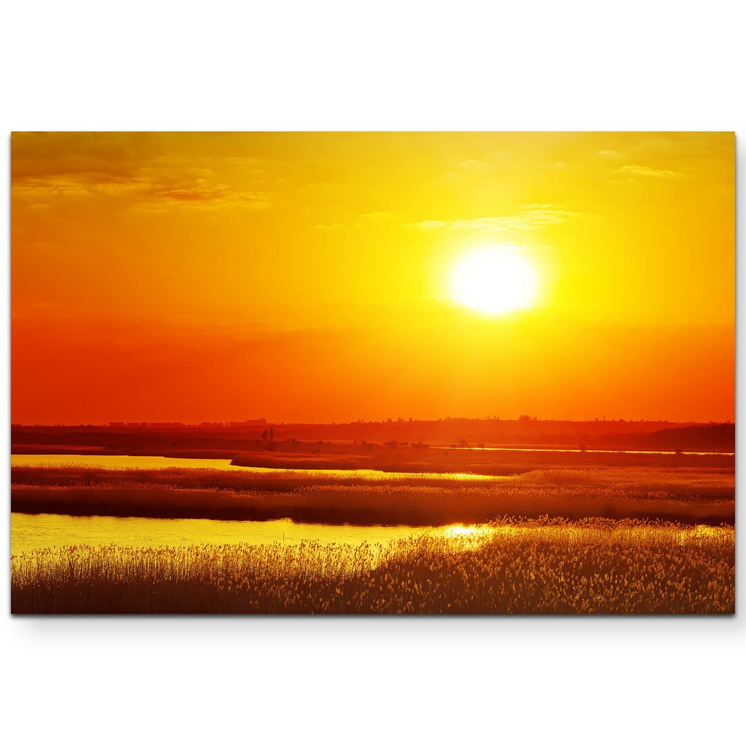 Leinwandbild Weite Landschaft bei Sonnenuntergang