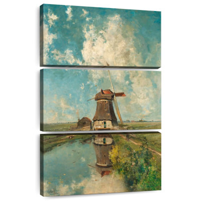 A Windmill On A Polder Waterway