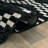 Modern Black And White Tribal Geometric Area Rug-446610400