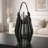Decorative Lantern, Sculptural Shape And Leather Handle, Black Wood 16 Inch