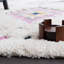 Tapis ivoire à motif géométrique Barden-826393682