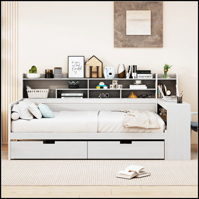 Lit de jour multifonctionnel avec tablettes de rangement, tiroirs et bureau d'étude intégré pour une vie moderne