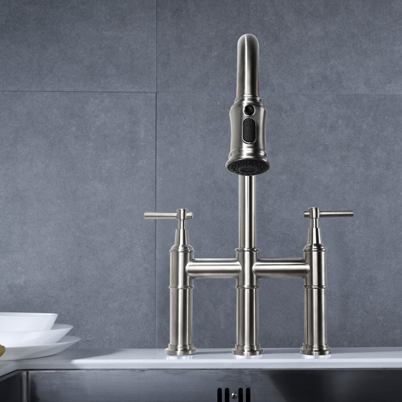 Brushed Nickel Pull-Down Kitchen Faucet. Precise Regulation Of Flow And Temperature Via Dual Handles. 360-Degree Rotating High Nozzle For Enhanced Sink Usage. Brass Silent Splash- Water . Three