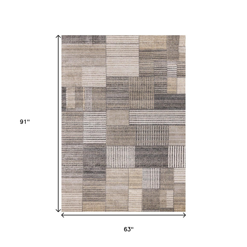 Tapis géométrique noir et beige 5 pi x 8 pi
