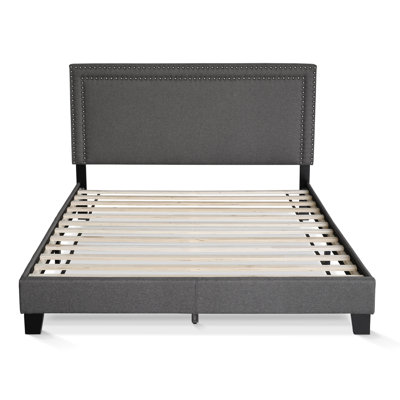 Carlester Upholstered Slat Bed