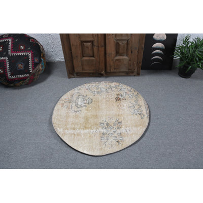 Tapis turc circulaire fabriqué à la main avec motifs floraux pour une décoration intérieure élégante