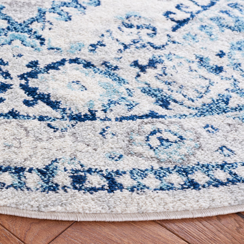 Tapis ivoire / bleu, Rond 6 pi 7 po