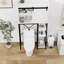Armoire de rangement de salle de bain au-dessus de la toilette avec porte de grange coulissante