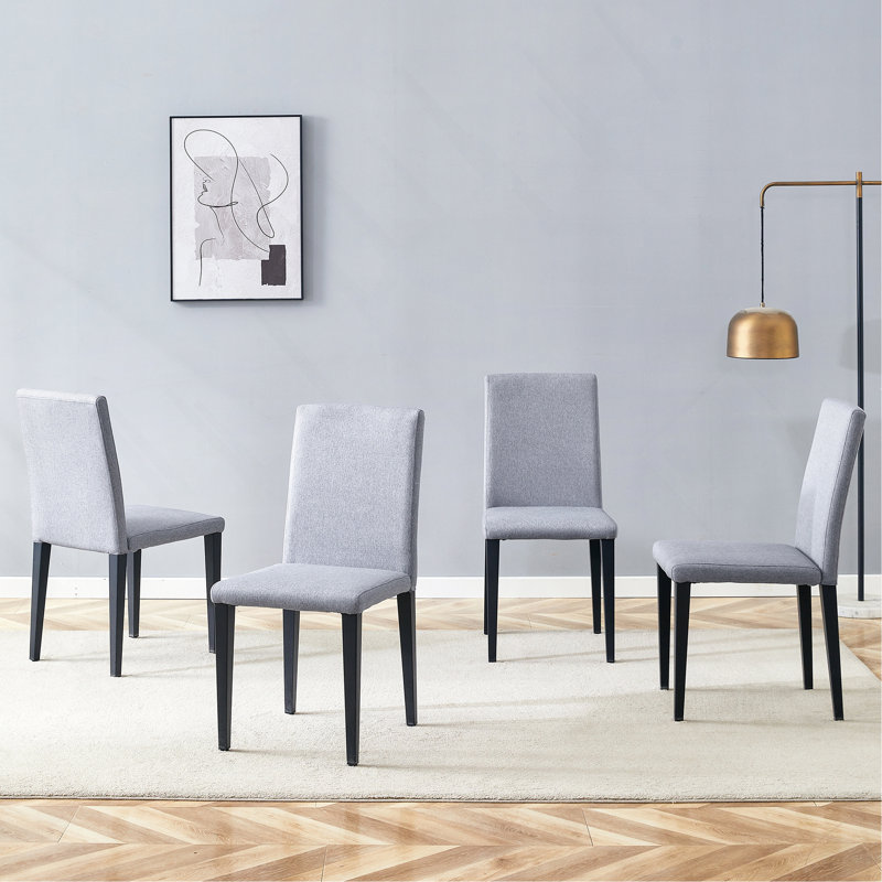 Quatre chaises de salle à manger en lin et coton gris clair, simples et polyvalentes, confortables et accompagnées. Des chaises de salle à manger exquises et polyvalentes offrent une nouvelle expérience confortable. (Ensemble de 4)
