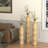 metal centre vases with growing vine patterns, set of 3