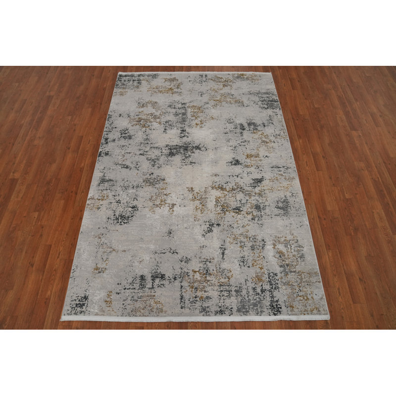 Tapis contemporain gris texturé subtilement doré 5 x 7