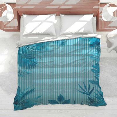 Édredon bleu à feuillage tropical