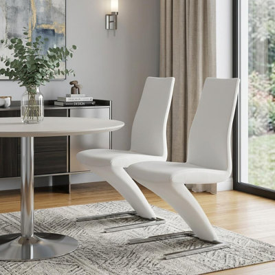 Gracie Mills Monroe Set of Two White and Silver Slipcovered Faux Leather Dining Side Chairs